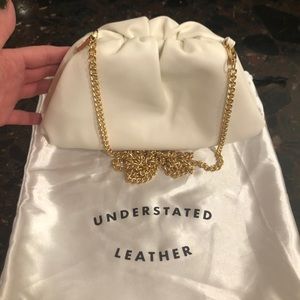 Understated Leather white leather clutch